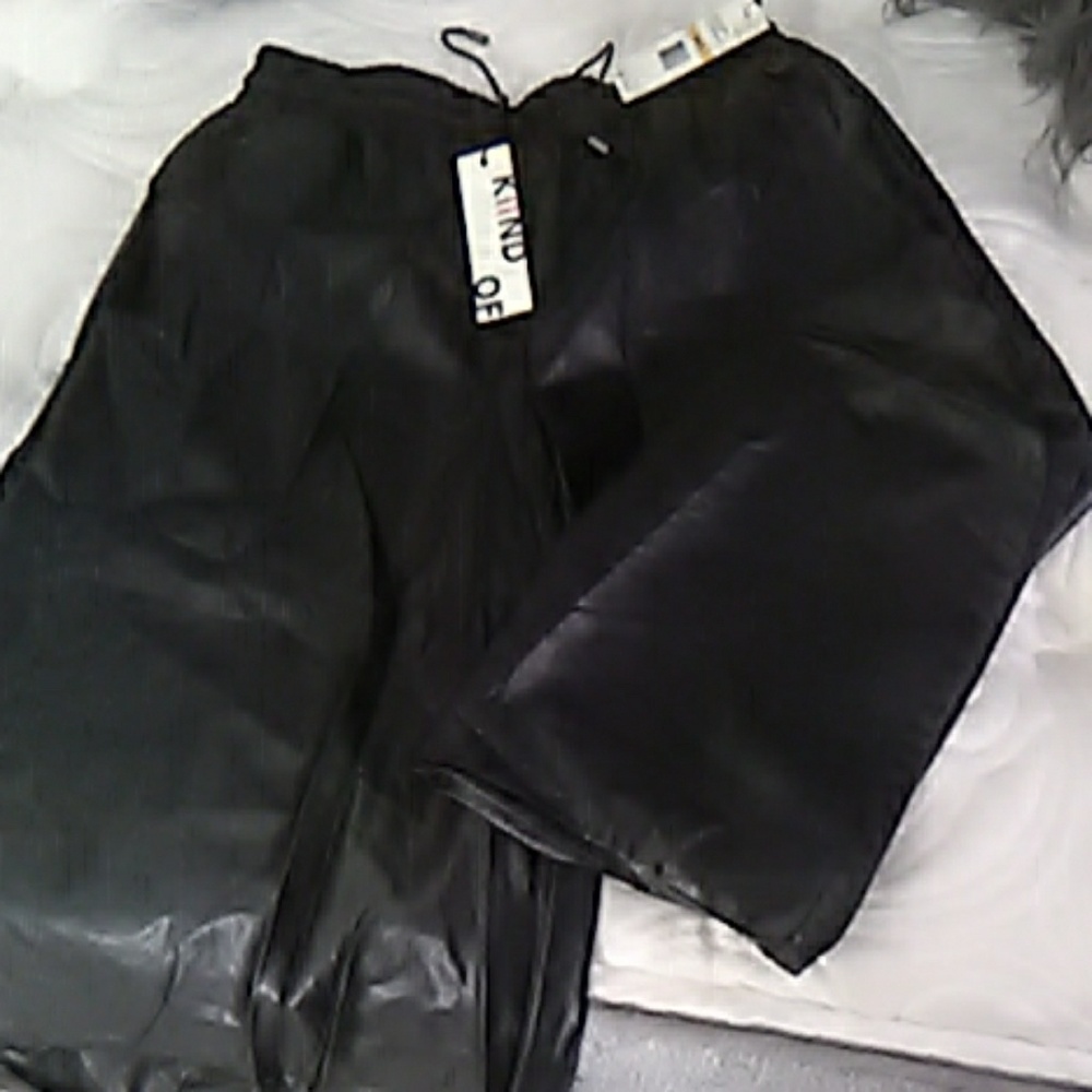 Kiind of under knee pleather pants